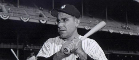 Yogi Berra signed swinging bat photo